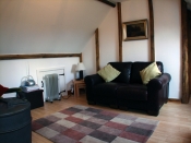The Hayloft living area, has woodburner and lovely views out to the countryside
