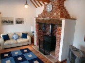Lounge, Stove, in Stable Cottage at Westbrooke Barns, holiday accommodation in central Norfolk
